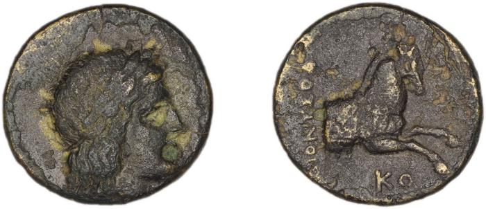 Colophon Kinns 1980 Period I.2, AE 9, реверс, bm