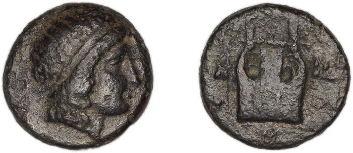 Colophon Kinns 1980 Period I.2, AE 6, реверс, bm