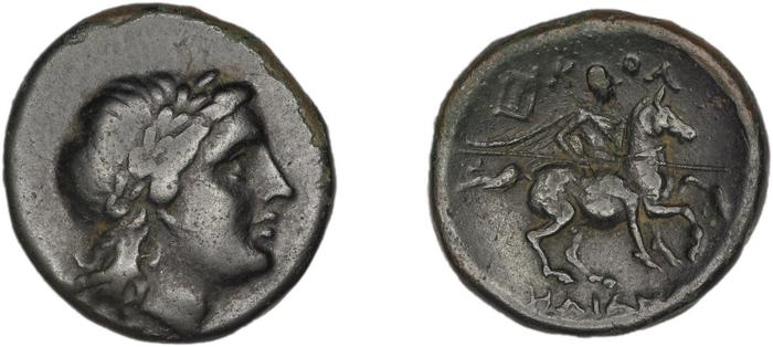 Colophon Kinns 1980 Period II, AE 14, реверс, bm