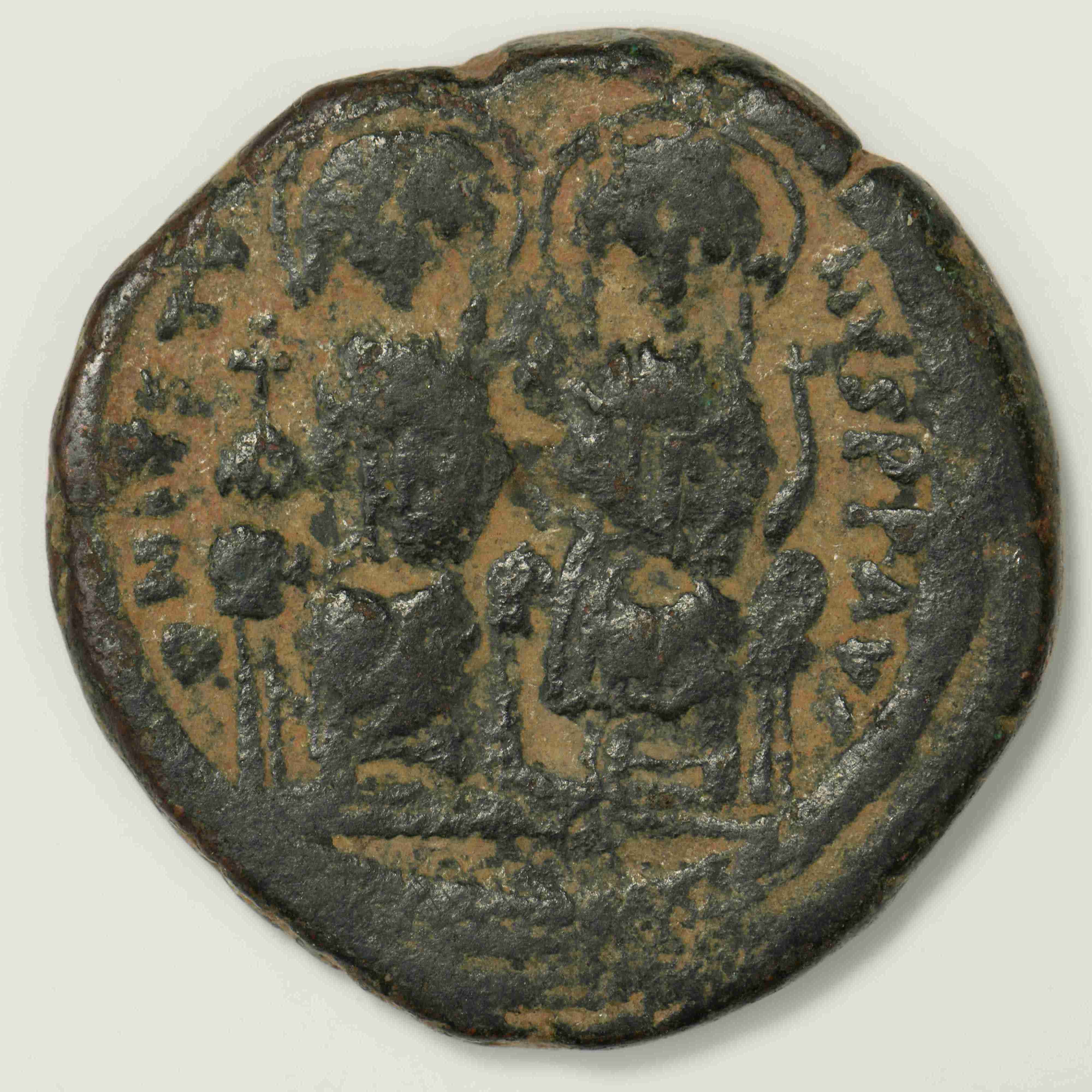 аверс Justin II — Follis (Constantinople, 567–568)