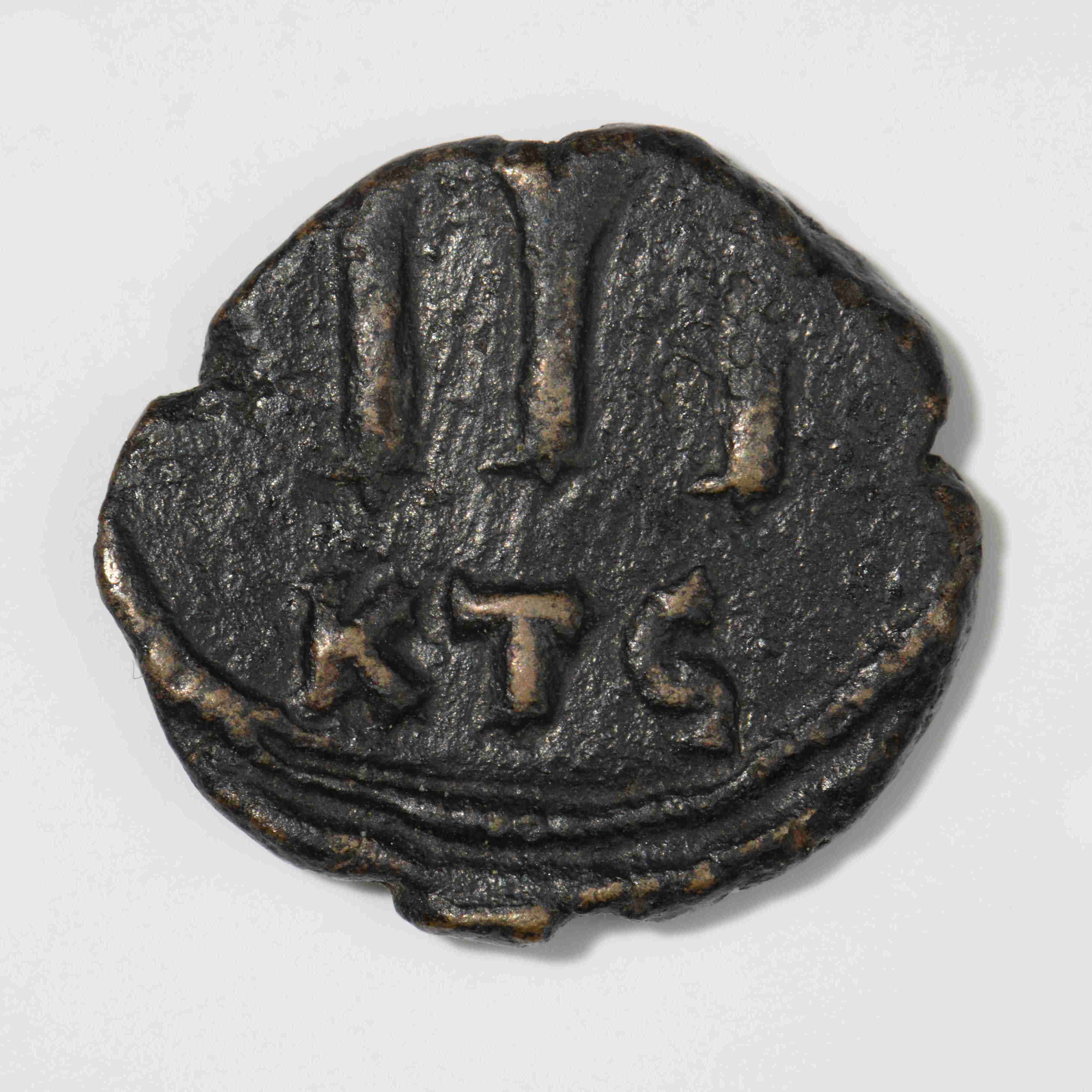 reverse Justinian II — Follis (Carthage, 686–687)
